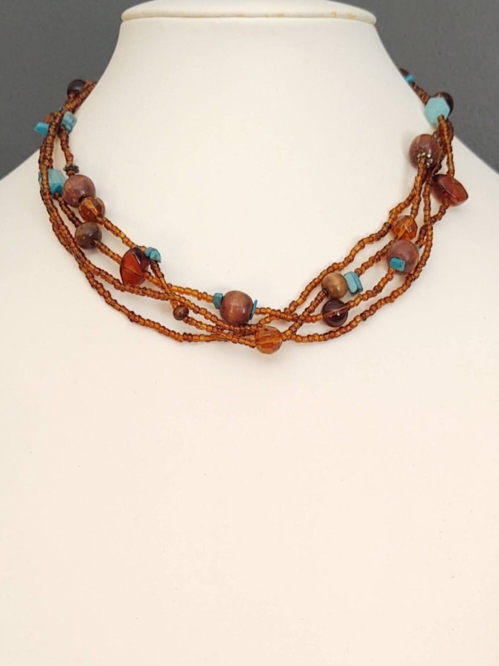 Amber and blue tones-seed bead and wood bead multi strand necklace